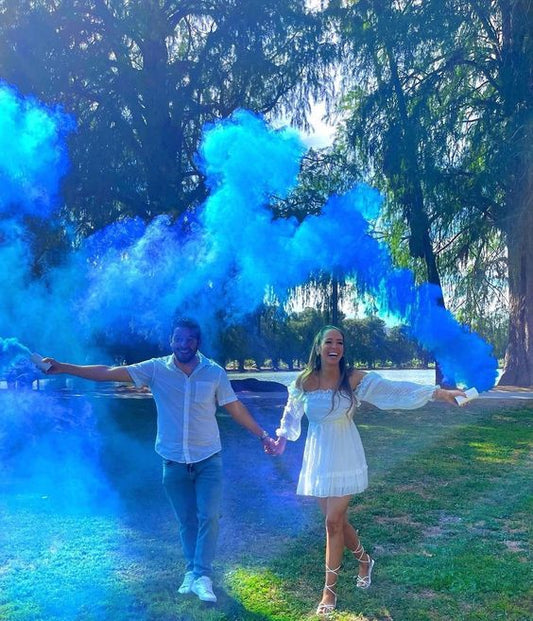 gender reveal party ，gender reveal party， baby shower gender reveal ideas， color spray